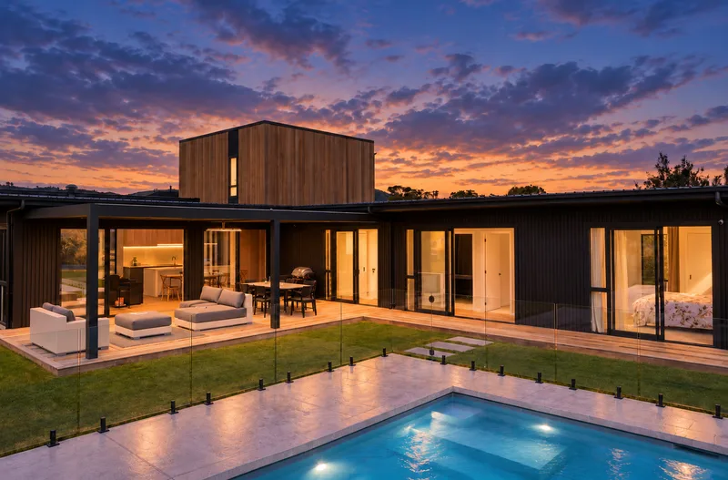 Pool & living at sunset, Cedar Cube House